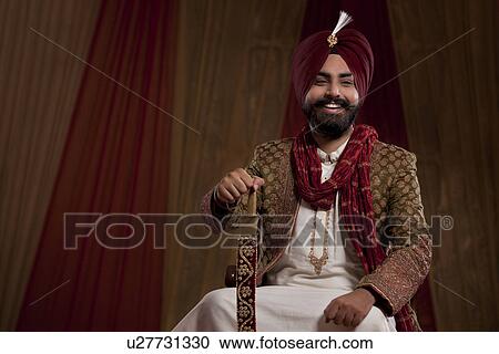 Smiling groom with sword View Large Photo Image Stock Image - Smiling groom with sword . Fotosearch