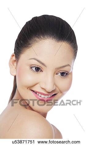 Smiling young woman looking down View Large Photo Image Stock Image - Smiling young woman looking down . Fotosearch
