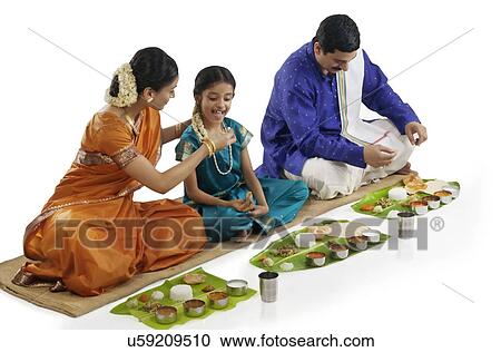 South Indian family having lunch View Large Photo Image Stock Image - South Indian family having lunch . Fotosearch