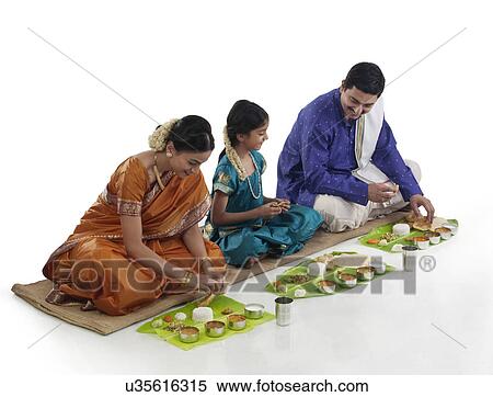 South Indian family having lunch View Large Photo Image Stock Photography - South Indian family having lunch . Fotosearch