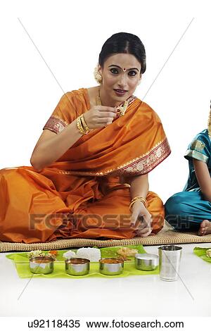 South Indian woman having lunch View Large Photo Image Stock Photography - South Indian woman having lunch . Fotosearch