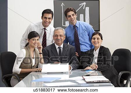 Successful business people smiling with confidence  View Large Photo Image Stock Photo - Successful business people smiling with confidence . Fotosearch