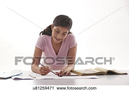 Teenage girl drawing a diagram View Large Photo Image Stock Image - Teenage girl drawing a diagram . Fotosearch