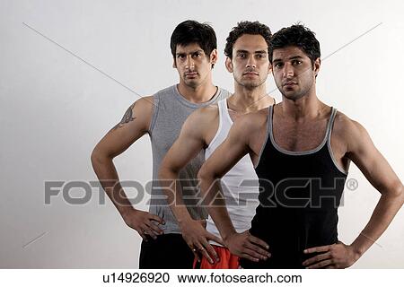 Three men posing View Large Photo Image Stock Image - Three men posing . Fotosearch