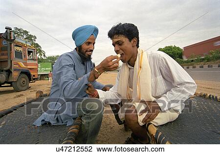 Truck drivers at a roadside dhaba View Large Photo Image Stock Image - Truck drivers at a roadside dhaba . Fotosearch
