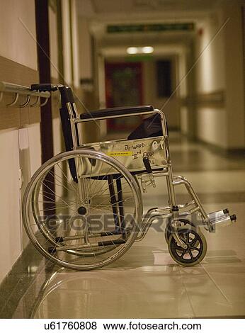 Wheelchair in the corridor View Large Photo Image Stock Photo - Wheelchair in the corridor . Fotosearch
