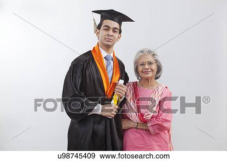 Woman at grandson's graduation ceremony View Large Photo Image Stock Photo - Woman at grandson's graduation ceremony. Fotosearch