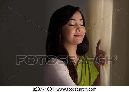 Woman breathing in fresh air View Large Photo Image Stock Image - Woman breathing in fresh air . Fotosearch
