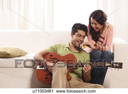 Woman feeding a man chocolate View Large Photo Image Stock Image - Woman feeding a man chocolate. Fotosearch