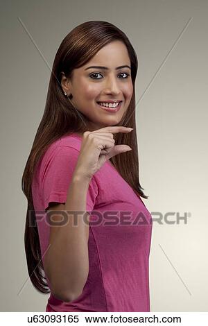 Woman gesturing View Large Photo Image Stock Photography - Woman gesturing . Fotosearch
