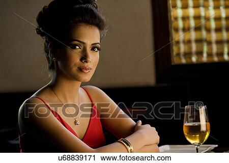 Woman in a restaurant View Large Photo Image Stock Image - Woman in a restaurant . Fotosearch