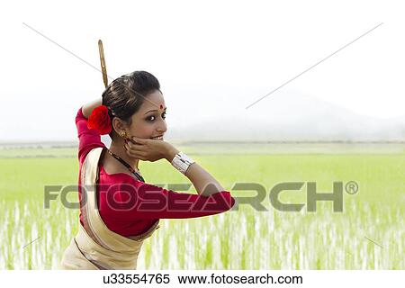 Woman performing Bihu dance View Large Photo Image Stock Photography - Woman performing Bihu dance . Fotosearch