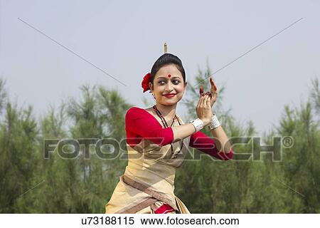 Woman performing Bihu dance View Large Photo Image Stock Photography - Woman performing Bihu dance . Fotosearch