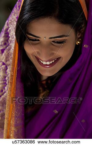 Woman smiling View Large Photo Image Stock Photograph - Woman smiling . Fotosearch