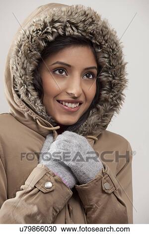 Woman wearing a hood View Large Photo Image Stock Image - Woman wearing a hood . Fotosearch