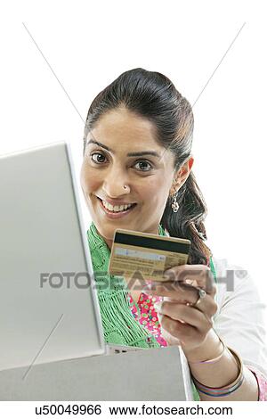 Woman with a credit card View Large Photo Image Stock Photograph - Woman with a credit card . Fotosearch