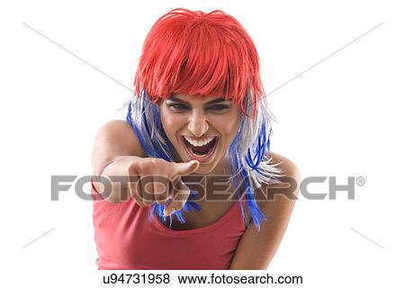 Woman with a wig pointing View Large Photo Image Stock Photo - Woman with a wig pointing . Fotosearch