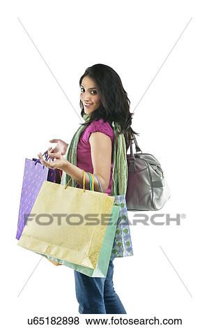 Woman with shopping bags View Large Photo Image Stock Photo - Woman with shopping bags . Fotosearch