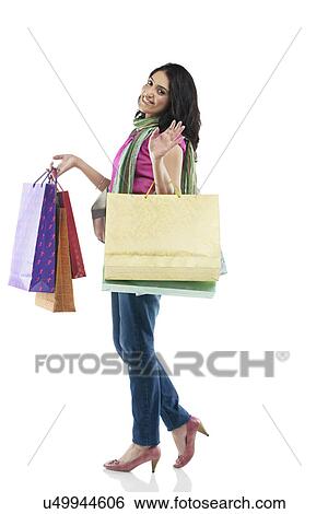 Woman with shopping bags View Large Photo Image Stock Photograph - Woman with shopping bags . Fotosearch