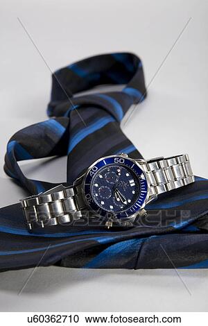 Wrist watch and tie View Large Photo Image Stock Image - Wrist watch and tie . Fotosearch