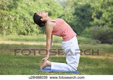 Stock Photo - Yoga camel pose . Fotosearch