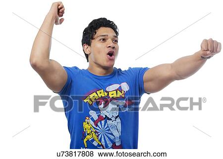 Young boy cheering View Large Photo Image Stock Photo - Young boy cheering . Fotosearch