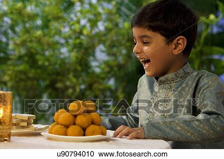 Young boy enjoying View Large Photo Image Stock Image - Young boy enjoying . Fotosearch