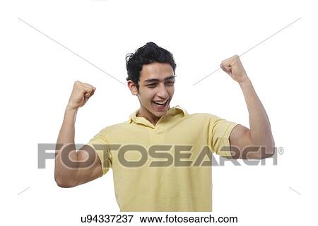 Stock Photo - Young boy feeling triumphant . Fotosearch