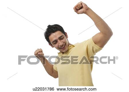 Young boy feeling triumphant View Large Photo Image Stock Photograph - Young boy feeling triumphant . Fotosearch