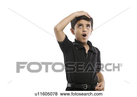 Young boy forgetting something View Large Photo Image Stock Photo - Young boy forgetting something . Fotosearch