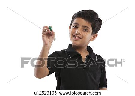 Young boy holding a marker pen View Large Photo Image Stock Photography - Young boy holding a marker pen . Fotosearch