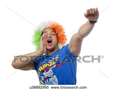 Young boy shouting and cheering View Large Photo Image Stock Photography - Young boy shouting and cheering . Fotosearch