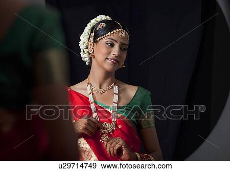 Young bride looking away View Large Photo Image Stock Photo - Young bride looking away . Fotosearch