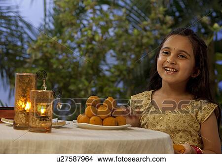Young girl enjoying herself View Large Photo Image Picture - Young girl enjoying herself . Fotosearch
