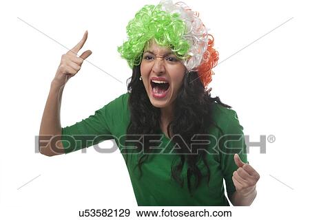 Young woman cheering View Large Photo Image Stock Photo - Young woman cheering . Fotosearch