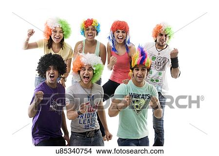 Youngsters with wigs cheering View Large Photo Image Picture - Youngsters with wigs cheering . Fotosearch