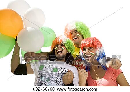 Youngsters with wigs cheering View Large Photo Image Stock Image - Youngsters with wigs cheering . Fotosearch