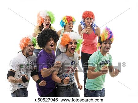 Youngsters with wigs cheering View Large Photo Image Stock Photograph - Youngsters with wigs cheering . Fotosearch