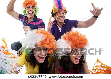 Youngsters with wigs cheering View Large Photo Image Stock Photography - Youngsters with wigs cheering . Fotosearch