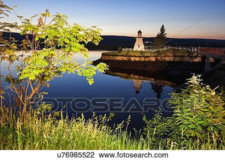 Anderson Hollow Lighthouse by pond at dusk View Large Photo Image Stock Image - Anderson Hollow Lighthouse by pond at dusk. Fotosearch