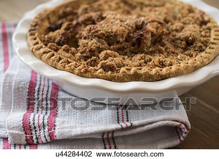 Apple pie on wood and cloth View Large Photo Image Stock Image - Apple pie on wood and cloth. Fotosearch