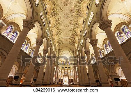 Stock Photograph - Basilica of Sainte-Anne-de-Beaupre, View along nave towards altar. Fotosearch