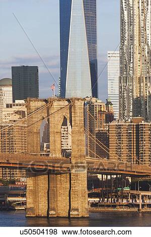 Stock Photo - Brooklyn Bridge and One World Trade Center. Fotosearch