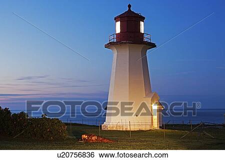 Stock Photograph - Cap Blanc Lighthouse at night. Fotosearch