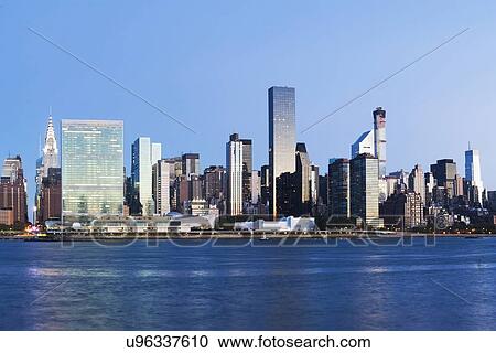 Stock Image - Cityscape at dusk. Fotosearch