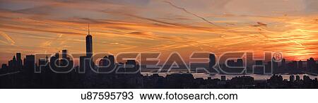 Stock Image - Cityscape at sunset. Fotosearch