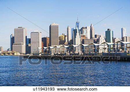 Cityscape under clear sky View Large Photo Image Stock Image - Cityscape under clear sky. Fotosearch