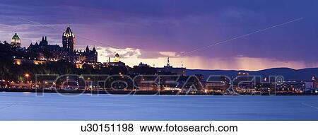 Cityscape with river and mountains on background View Large Photo Image Stock Photo - Cityscape with river and mountains on background. Fotosearch