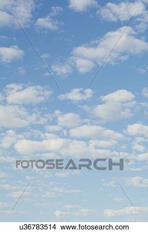 Picture - Clouds in blue sky. Fotosearch