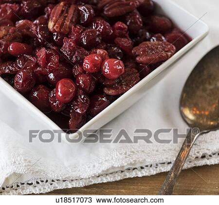 Stock Image - Cranberry sauce on white napkin. Fotosearch